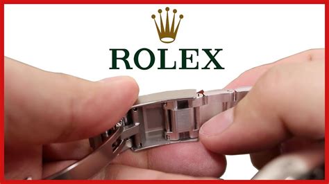 how to open rolex clasp.